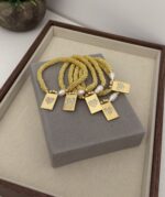Elastic bracelet with gold plated and pearl - Imagen 3