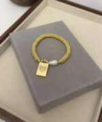 Elastic bracelet with gold plated and pearl - Imagen 2