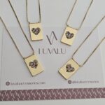 Zircon heart, gold plated.