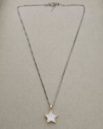 Silver chain and golden star, silver and gold plated.