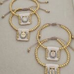 .SCAPULAR BRACELET