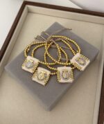.SCAPULAR BRACELET