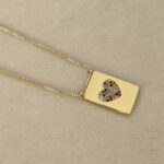 .Zircon heart, gold plated.
