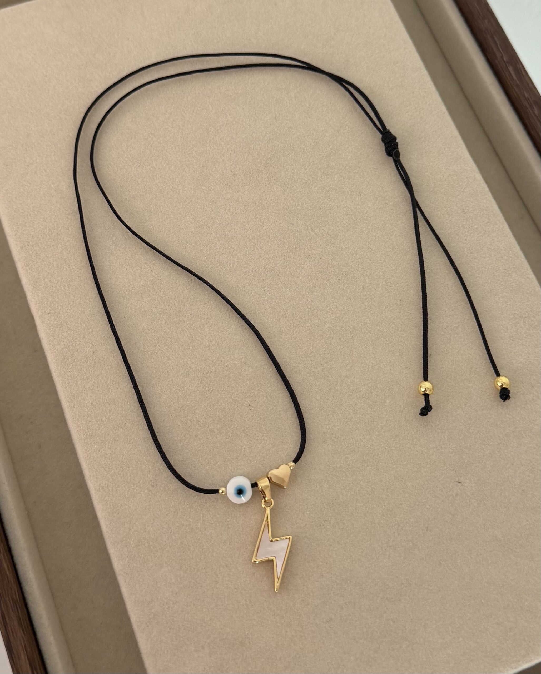 IMG_2249 Lightning and evil eye, black cord. - Imagen 1
