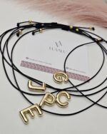 Black Cord, Initials