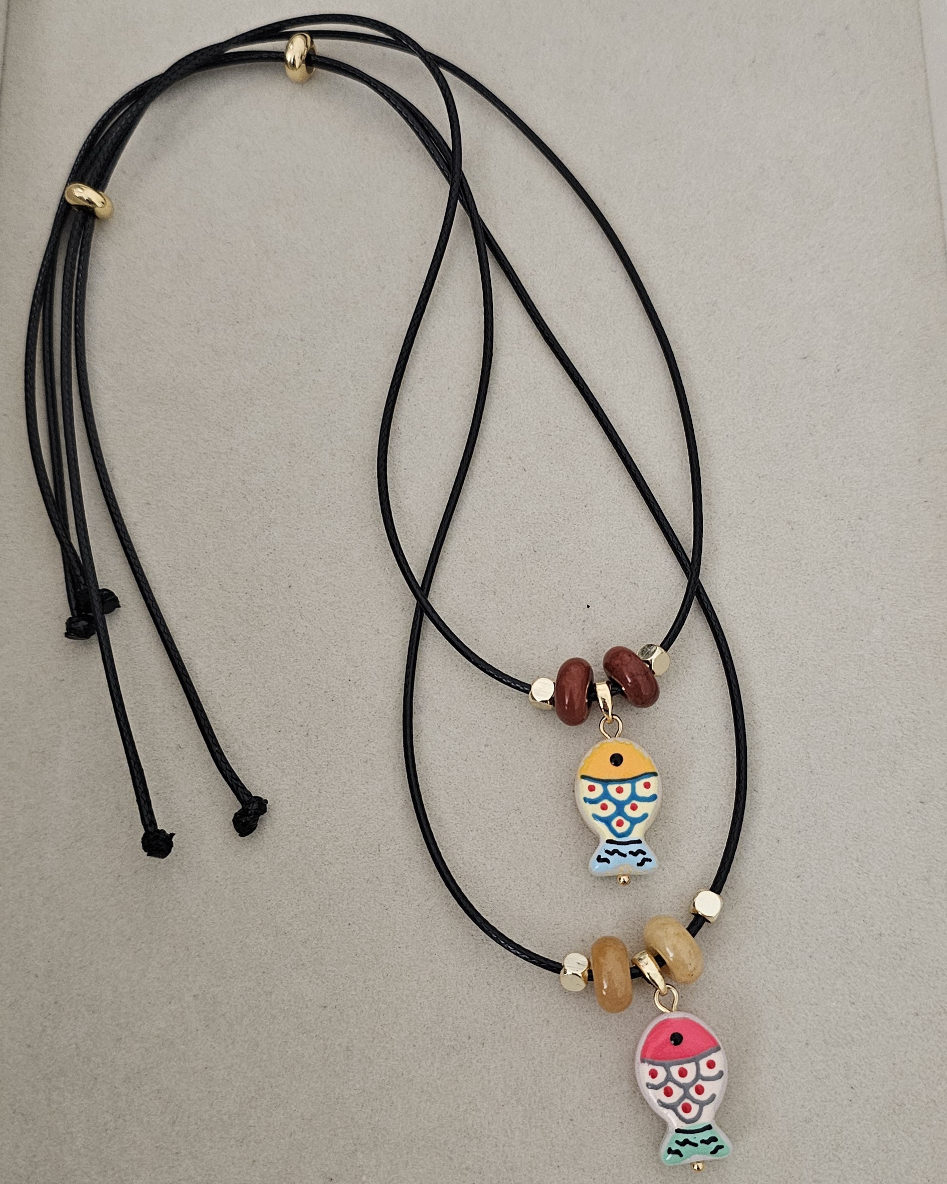 20260810_175422 ..Fish Cord Necklace - Imagen 1