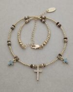 ...Natural stone necklace with turquoise-colored zirconia crosses