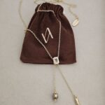 ...Lariat-style necklace